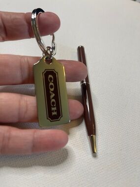 Coach Silver Key Tag with Brown Logo Panel and Brown Coach Pen